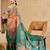 Multi color shimmer printed zari saree with unstitched blouse piece.