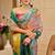 Multi color shimmer printed zari saree with unstitched blouse piece.