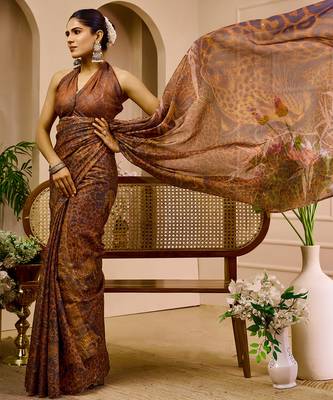 Brown shimmer printed zari saree with unstitched blouse piece. 1