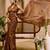 Brown shimmer printed zari saree with unstitched blouse piece.