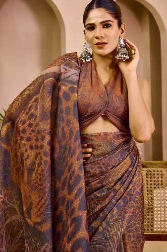 Brown shimmer printed zari saree with unstitched blouse piece.