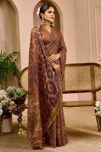 Brown shimmer printed zari saree with unstitched blouse piece.