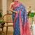 Blue shimmer printed zari saree with unstitched blouse piece.