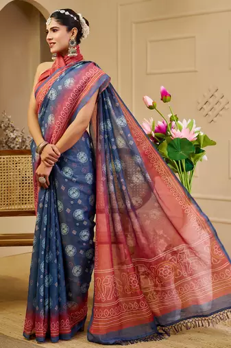 Blue shimmer printed zari saree with unstitched blouse piece.