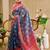 Blue shimmer printed zari saree with unstitched blouse piece.