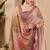 Mauve shimmer printed zari saree with unstitched blouse piece.