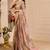 Mauve shimmer printed zari saree with unstitched blouse piece.