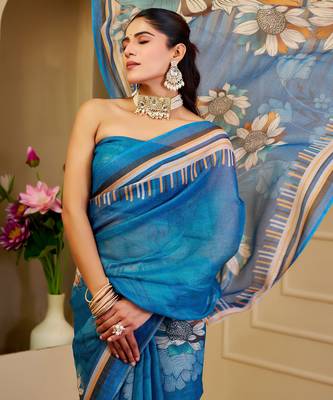 Blue shimmer printed zari saree with unstitched blouse piece. 1