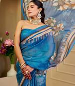 Blue shimmer printed zari saree with unstitched blouse piece.