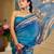 Blue shimmer printed zari saree with unstitched blouse piece.