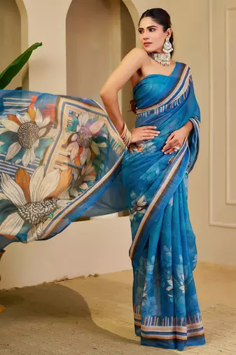 Blue shimmer printed zari saree with unstitched blouse piece.