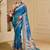Blue shimmer printed zari saree with unstitched blouse piece.