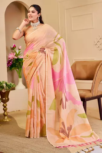 Peach shimmer printed zari saree with unstitched blouse piece.