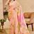 Peach shimmer printed zari saree with unstitched blouse piece.