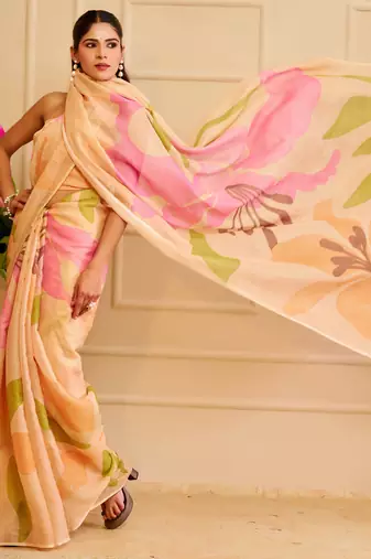 Peach shimmer printed zari saree with unstitched blouse piece.