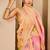 Peach shimmer printed zari saree with unstitched blouse piece.