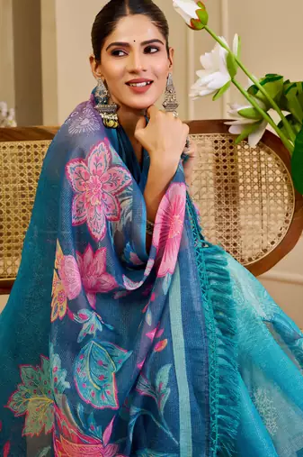 Blue shimmer printed zari saree with unstitched blouse piece.
