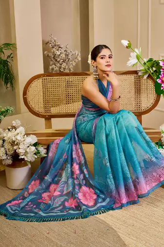 Blue shimmer printed zari saree with unstitched blouse piece.