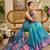 Blue shimmer printed zari saree with unstitched blouse piece.