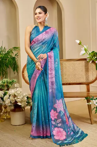 Blue shimmer printed zari saree with unstitched blouse piece.