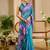 Blue shimmer printed zari saree with unstitched blouse piece.
