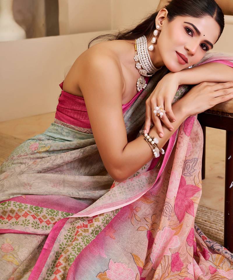Pink shimmer printed zari saree with unstitched blouse piece.