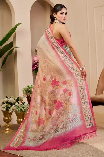 Pink shimmer printed zari saree with unstitched blouse piece.