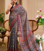 Grey shimmer printed zari saree with unstitched blouse piece.