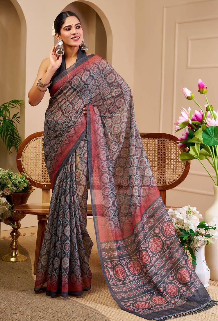 Grey shimmer printed zari saree with unstitched blouse piece.