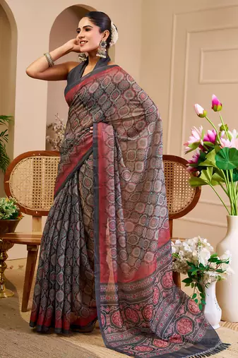 Grey shimmer printed zari saree with unstitched blouse piece.
