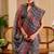 Grey shimmer printed zari saree with unstitched blouse piece.