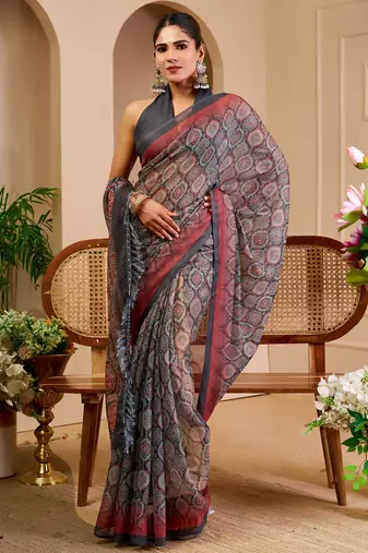 Grey shimmer printed zari saree with unstitched blouse piece.