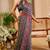 Grey shimmer printed zari saree with unstitched blouse piece.
