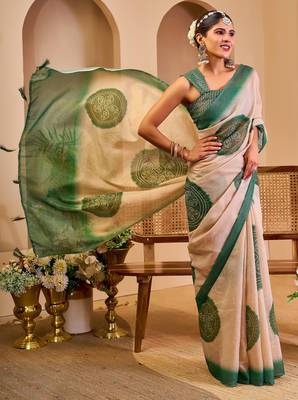 Beige shimmer printed zari saree with unstitched blouse piece. 1