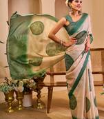 Beige shimmer printed zari saree with unstitched blouse piece.