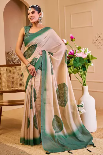 Beige shimmer printed zari saree with unstitched blouse piece.