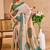 Beige shimmer printed zari saree with unstitched blouse piece.