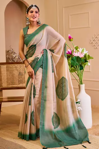 Beige shimmer printed zari saree with unstitched blouse piece.