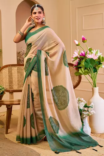 Beige shimmer printed zari saree with unstitched blouse piece.