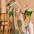 Beige shimmer printed zari saree with unstitched blouse piece.