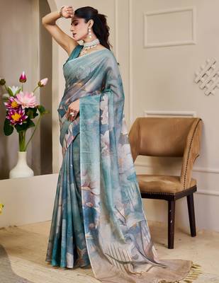 Turquoise shimmer printed zari saree with unstitched blouse piece. 4
