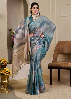 Turquoise shimmer printed zari saree with unstitched blouse piece. 5