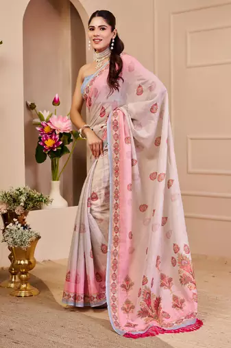 Pink shimmer printed zari saree with unstitched blouse piece.
