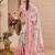 Pink shimmer printed zari saree with unstitched blouse piece.