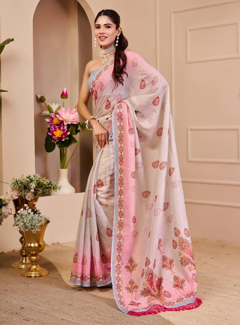 Pink shimmer printed zari saree with unstitched blouse piece.