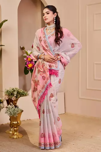 Pink shimmer printed zari saree with unstitched blouse piece.