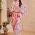 Pink shimmer printed zari saree with unstitched blouse piece.
