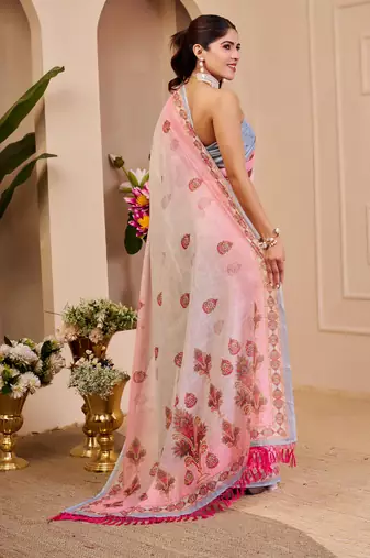 Pink shimmer printed zari saree with unstitched blouse piece.