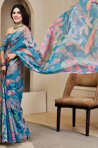 Blue shimmer printed zari saree with unstitched blouse piece.