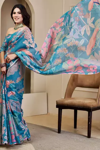 Blue shimmer printed zari saree with unstitched blouse piece.